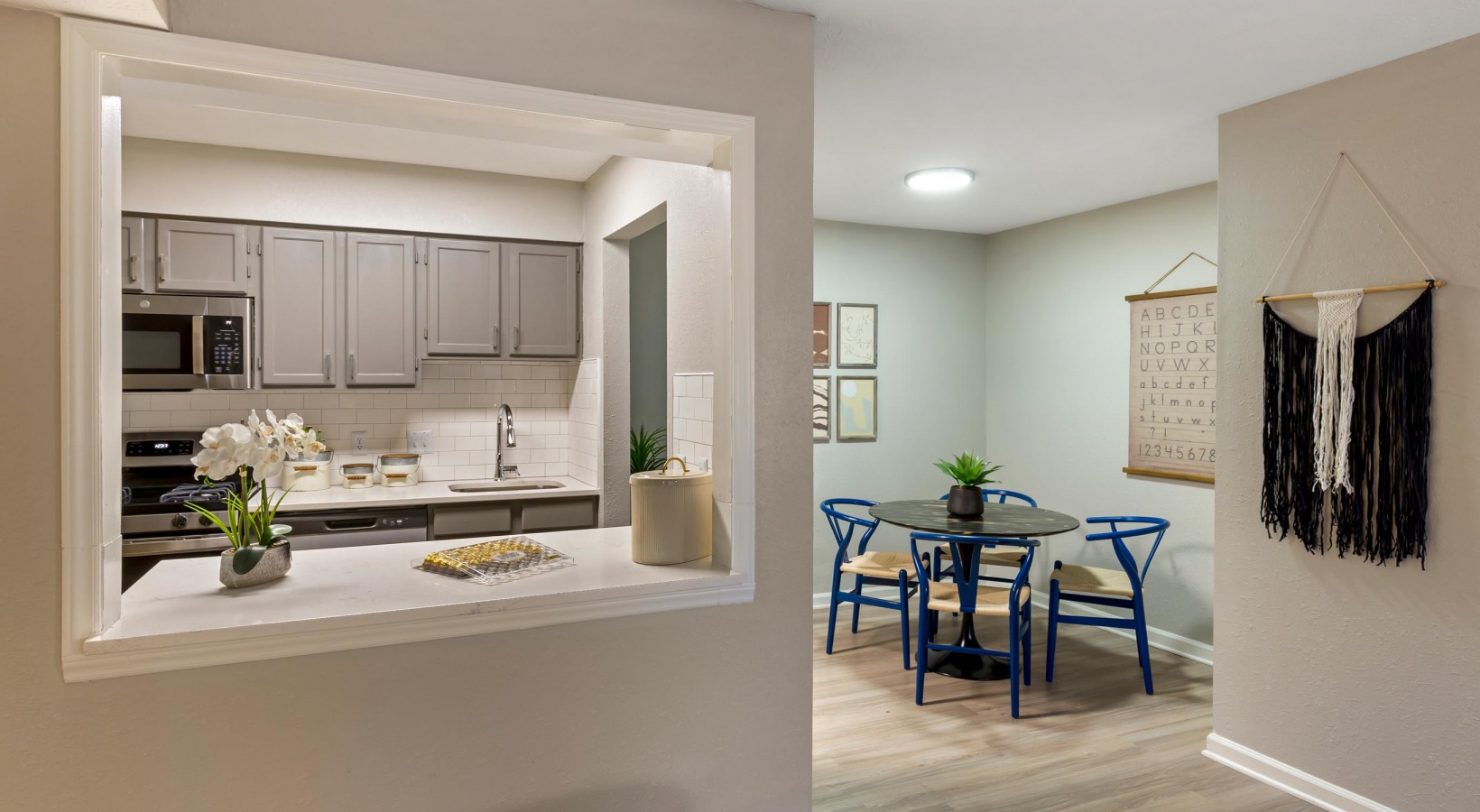 a kitchen and dining area in a new apartment at The  Hargrove at Southpoint