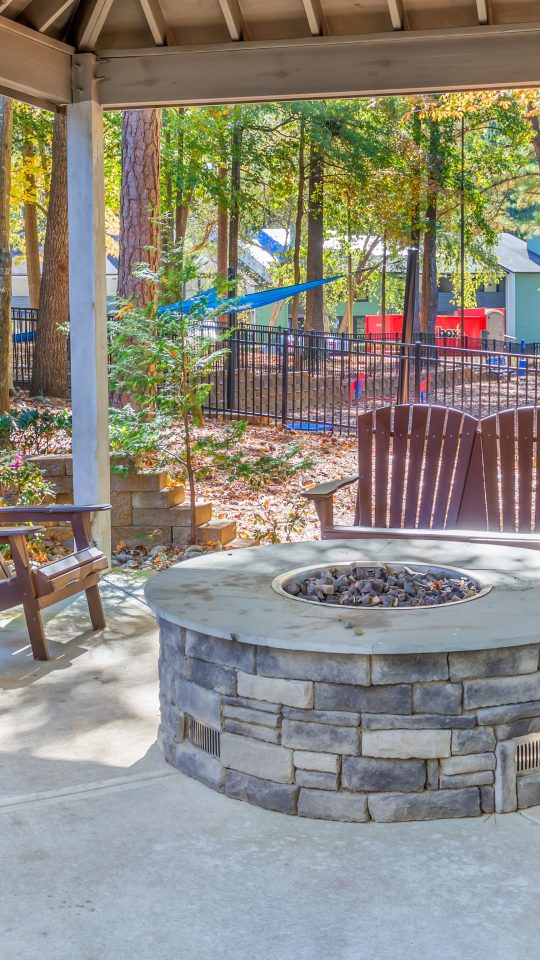 a fire pit in a gazebo at a park at The  Hargrove at Southpoint